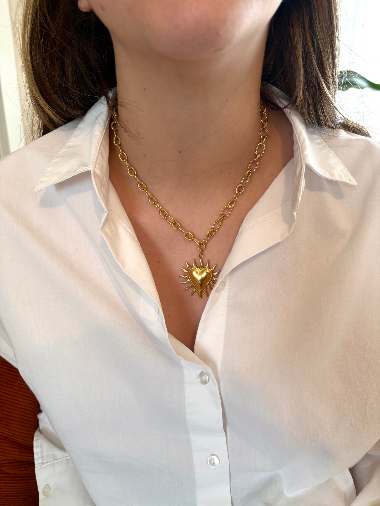 Collier cœur flamme