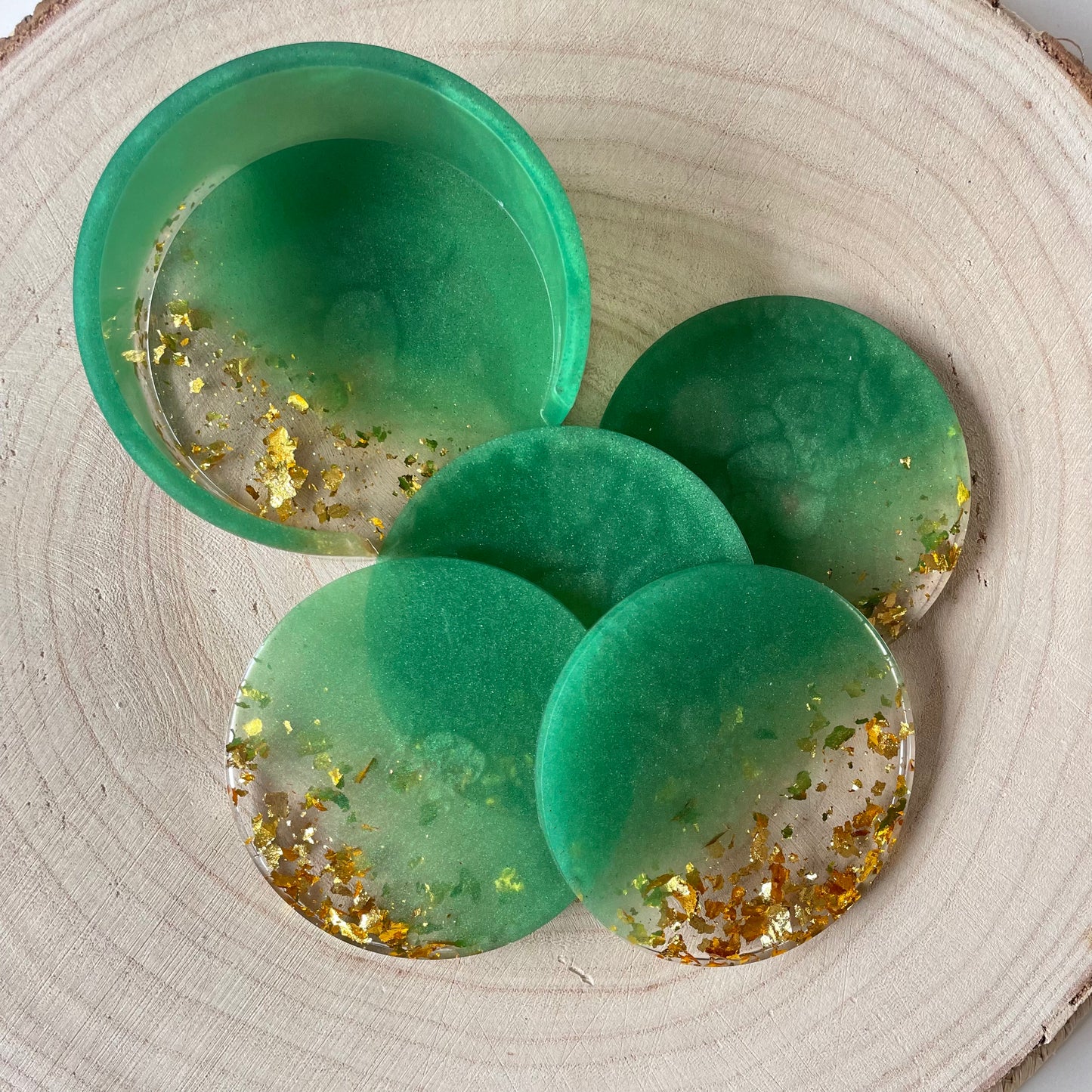 Dessous de verres avec rangement vert doré