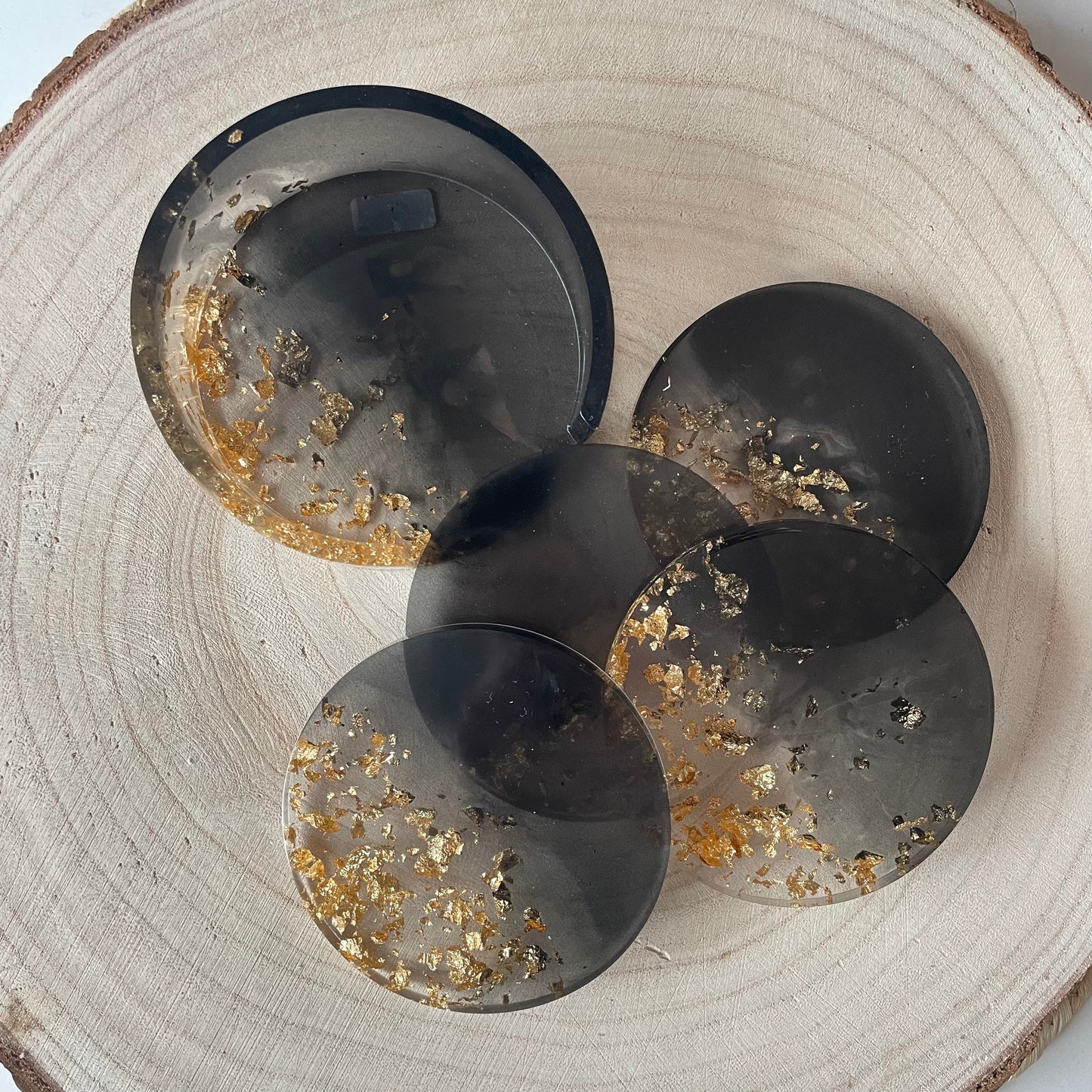 Dessous de verre avec rangement noir doré